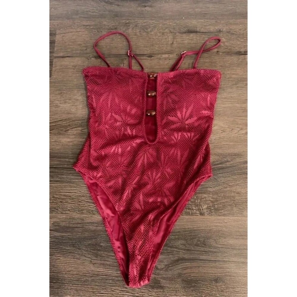 One piece swimwear with beaded cutout size Small